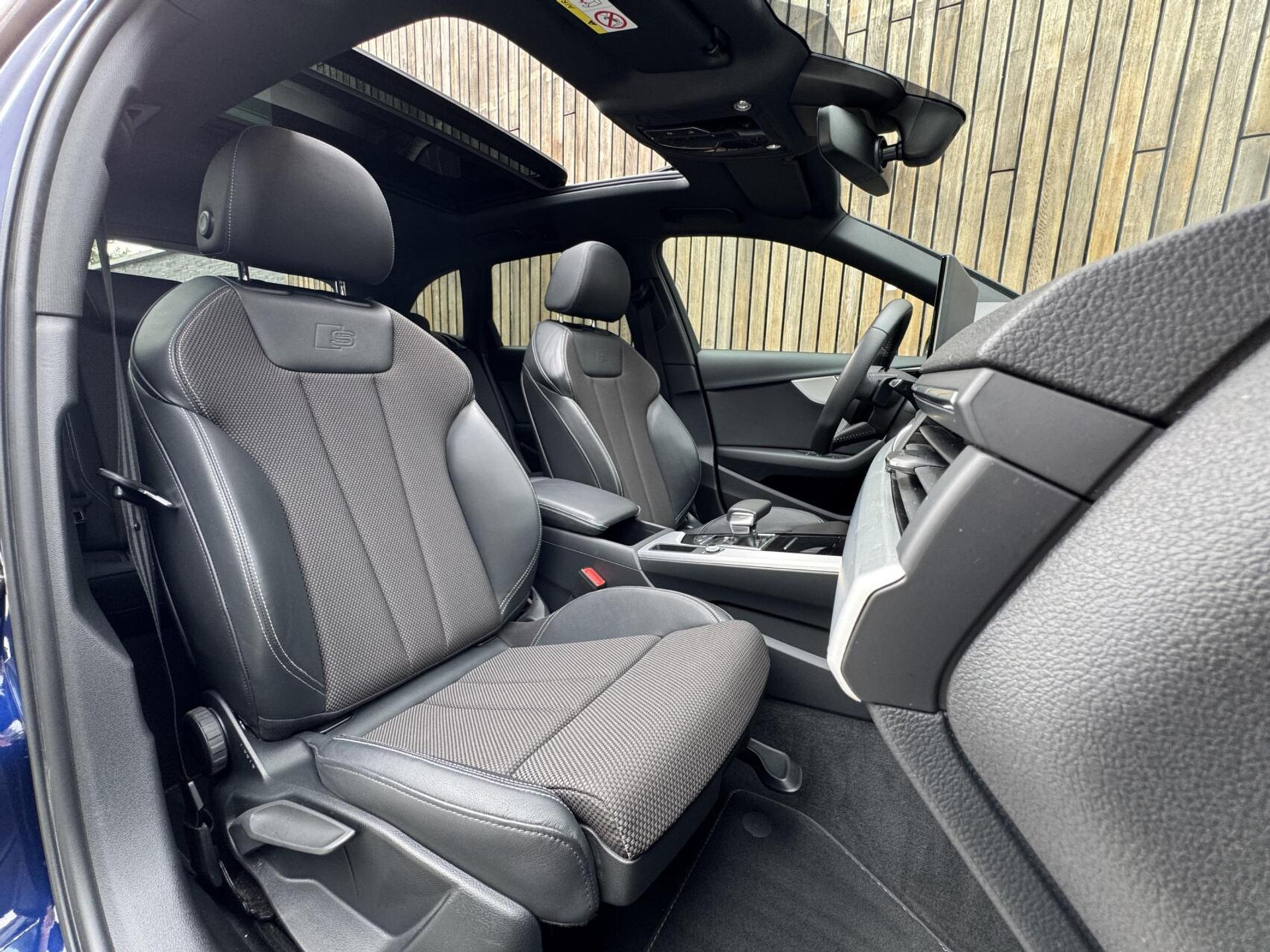 Audi A4 Avant 35 TFSI S-line Automaat | Panoramadak | Adaptieve cruise control | Grootlicht assistentie| Afgevlakt stuurwiel | Climate control | Getint glas | Zwart optiek | Parkeersensoren voor en achter 46807386-36.jpg | Timcars.nl