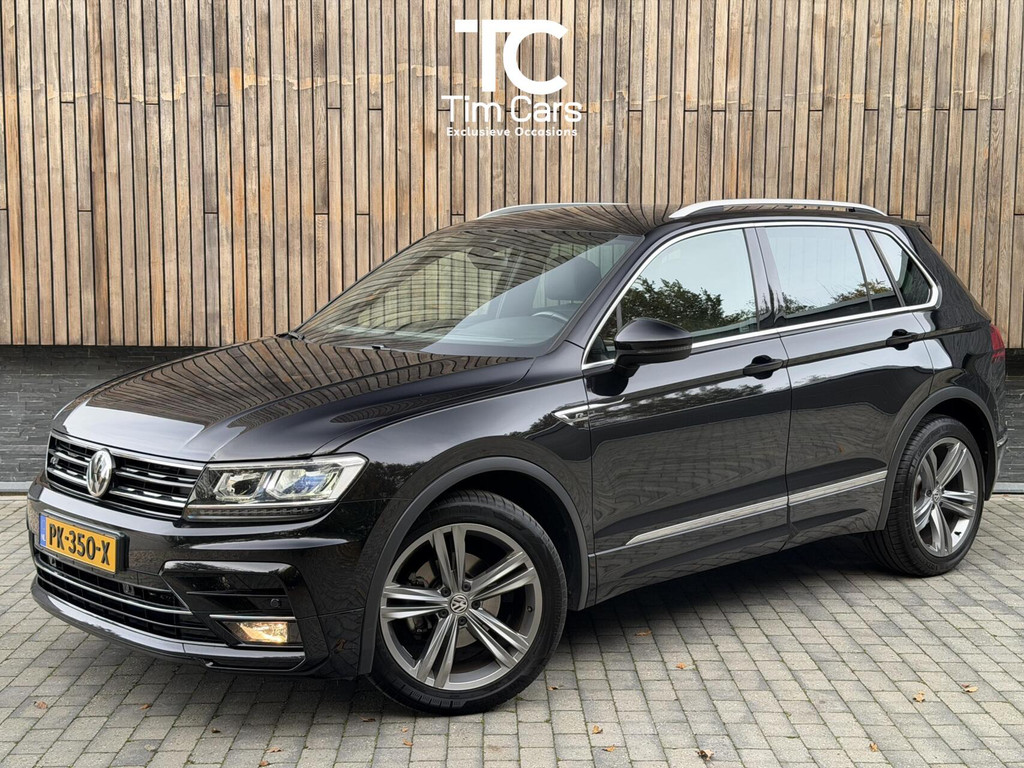Volkswagen Tiguan 1.4 TSI R-line Handgeschakeld | Half/leer | R-line stuurwiel | LED verlichting | Stoelverwarming | Zwarte hemelbekleding | Apple CarPlay | Adaptieve cruise control | Parkeersensoren voor en achter 49039395-0.jpg | Timcars.nl