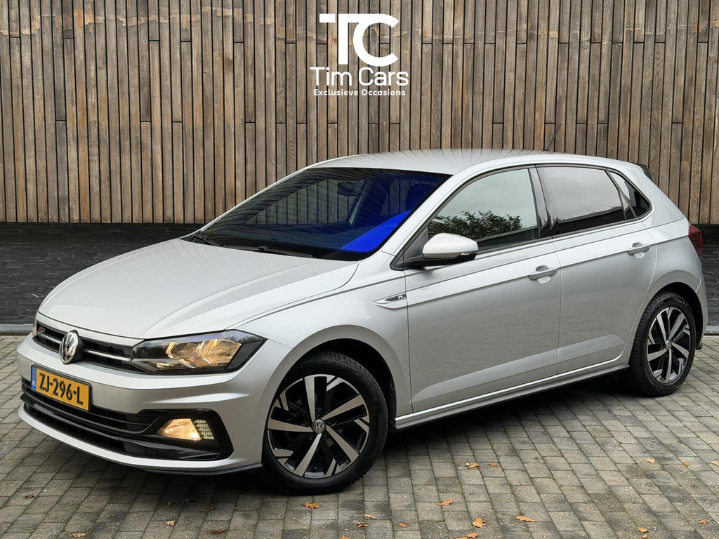 Volkswagen Polo 1.0 TSI R-line | Half leer | Sportstoelen | Airconditioning | Adaptieve cruise control | Trekhaak | Getint glas | Apple CarPlay | Zwarte hemelbekleding | Cameleon voorraam 49182759-0.jpg | Timcars.nl