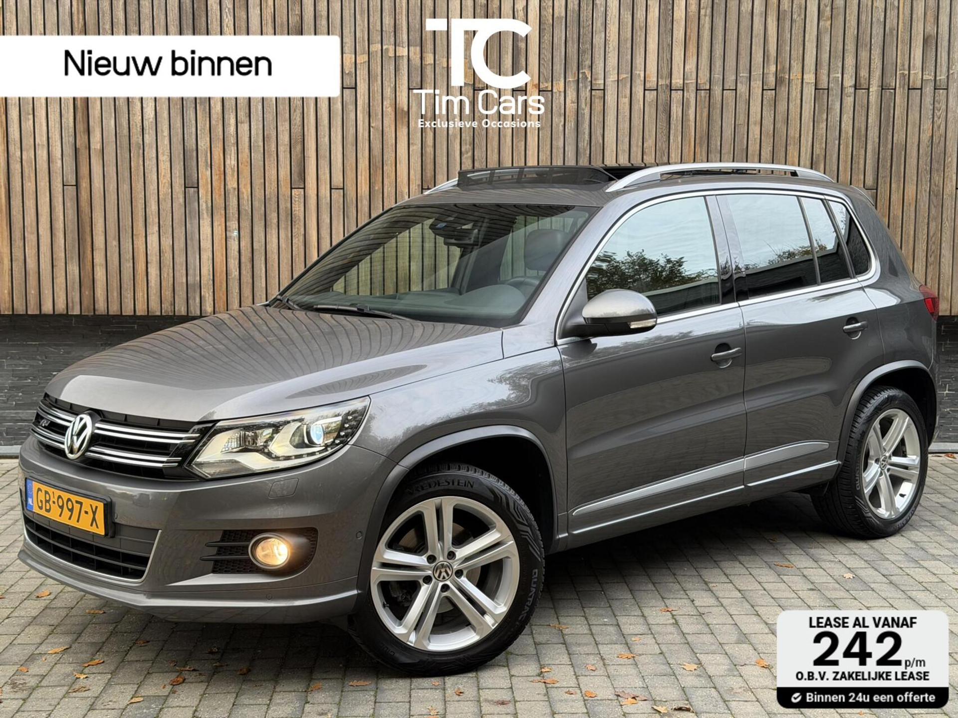 Volkswagen Tiguan 1.4 TSI R-Line Panoramadak | Leren bekleding | Elektrisch verstelbare bestuurdersstoel | Stoelverwarming | Climate & cruise control | Lane assist | Keyless entry&start | Parkeersensoren voor en achter | Achteruitrijcamera 49220413-0.jpg | Timcars.nl