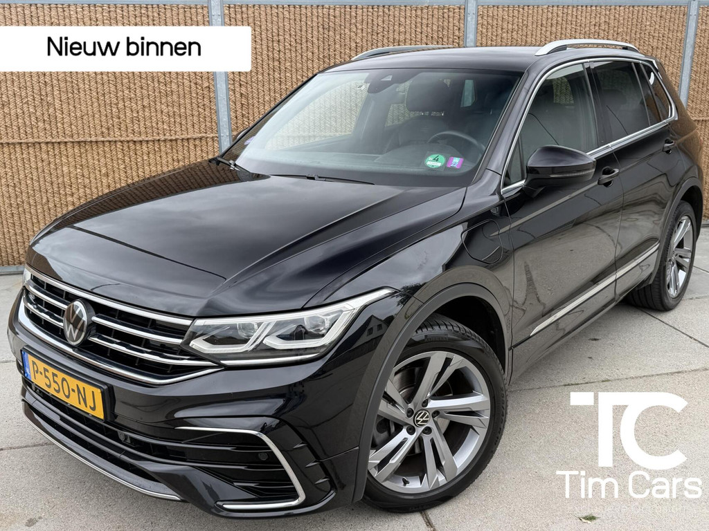 Volkswagen Tiguan 1.4 TSI eHybrid R-Line Business+ Trekhaak uitklapbaar | LED IQ. Light | Getint glas | Achteruitrijcamera | Parkeersensoren voor en achter | Navigatiesysteem | Apple CarPlay/Android Auto | Cruise control adaptief 54872276-0.jpg | Timcars.nl