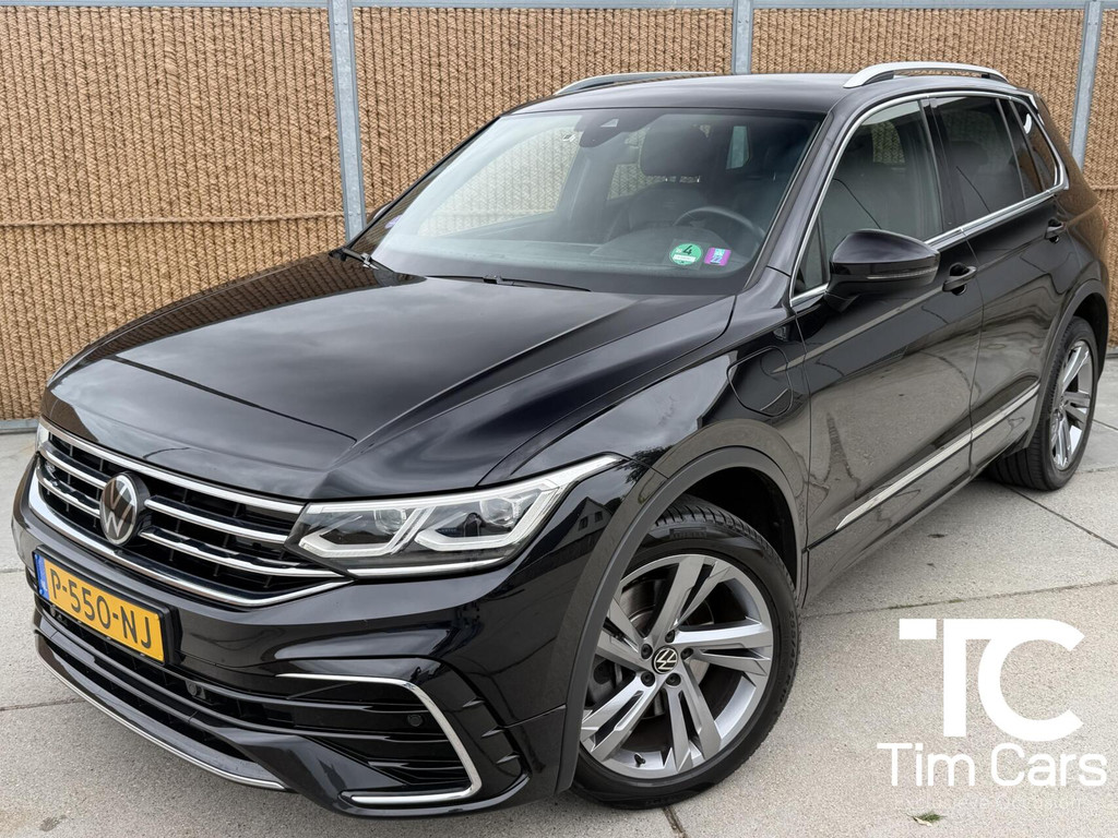 Volkswagen Tiguan 1.4 TSI eHybrid R-Line Business+ Trekhaak uitklapbaar | LED IQ. Light | Getint glas | Achteruitrijcamera | Parkeersensoren voor en achter | Navigatiesysteem | Apple CarPlay/Android Auto | Cruise control adaptief 54872276-0.jpg | Timcars.nl