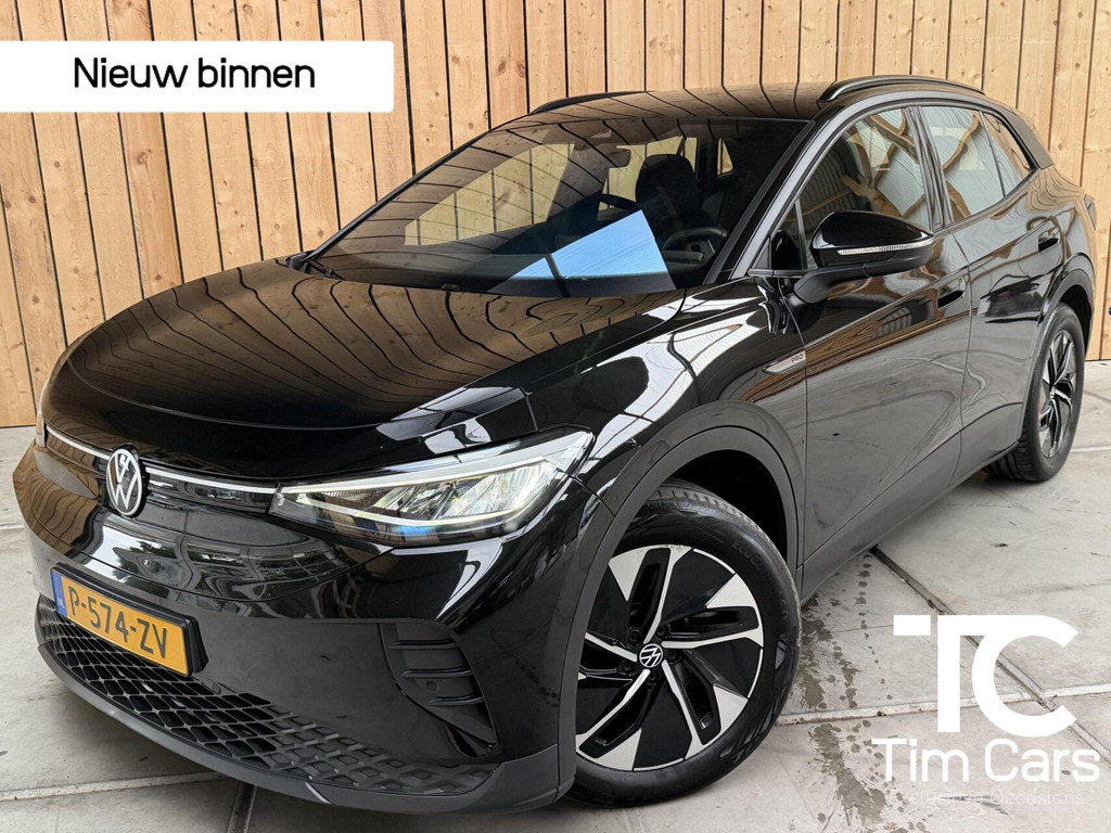 Volkswagen ID.4 Pro 77 kWh SoH 94,68% | Warmtepomp | Apple CarPlay/Android Auto | Adaptieve cruise control | Climate control | LED koplampen | Navigatiesysteem | Voorstoelen en stuurwiel verwarmd | Parkeersensoren voor en achter 57062797-0.jpg | Timcars.nl