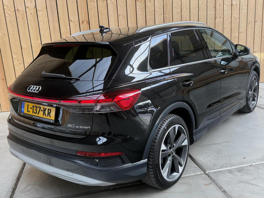 Audi Q4 e-tron 40 Launch edition Advanced 77 kWh SoH 91,95% Warmtepomp | Achteruitrijcamera | Adaptieve cruise control | Apple CarPlay/Android Auto | Climate control | Matrix LED | Navigatiesysteem | Voorstoelen verwarmd | Parkeersensoren 57062844-1.jpg | Timcars.nl