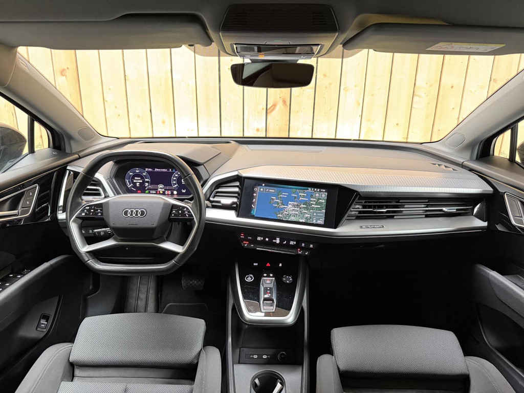 Audi Q4 e-tron 40 Launch edition Advanced 77 kWh SoH 91,95% Warmtepomp | Achteruitrijcamera | Adaptieve cruise control | Apple CarPlay/Android Auto | Climate control | Matrix LED | Navigatiesysteem | Voorstoelen verwarmd | Parkeersensoren 57062844-2.jpg | Timcars.nl